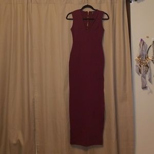 Long fitted dress with a slit down the side
